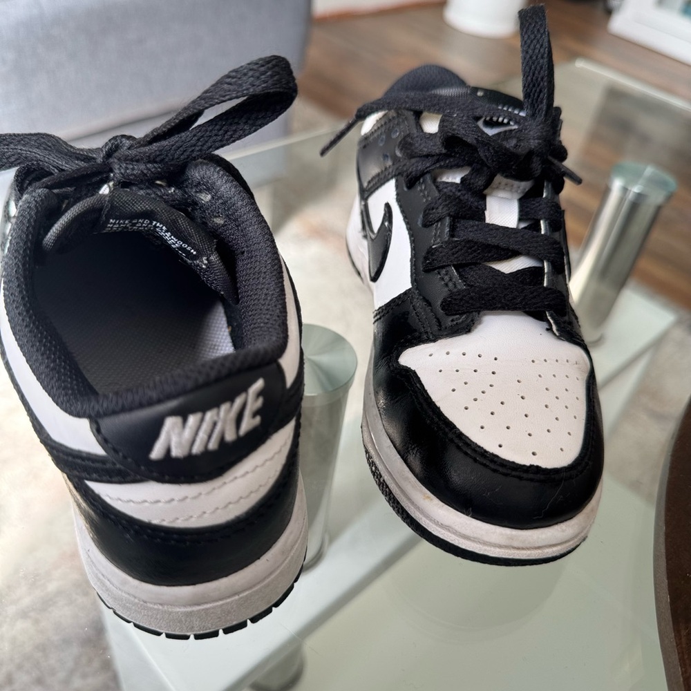Nike Kids Black and White Sneakers, used but in good condition no box.